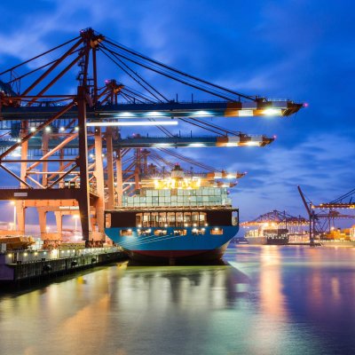 cargo-ship-at-terminal-dusk-reduced